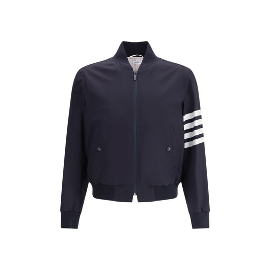 Thom Browne Wool Jacket with ribbed collar, zipper closure, side pockets, ribbed cuffs, hem, and signature band on left arm.