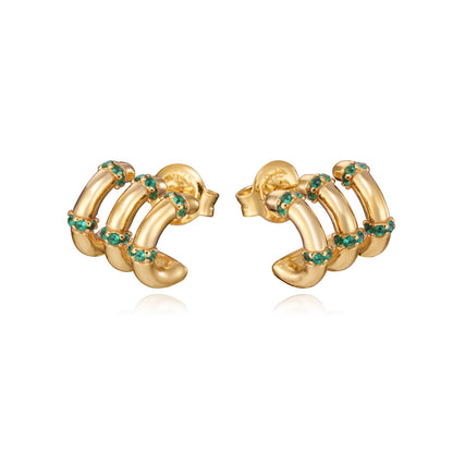 Gold and emerald hoop earrings with unique design, perfect for elegant occasions. Fashion jewelry highlighting style and luxury.