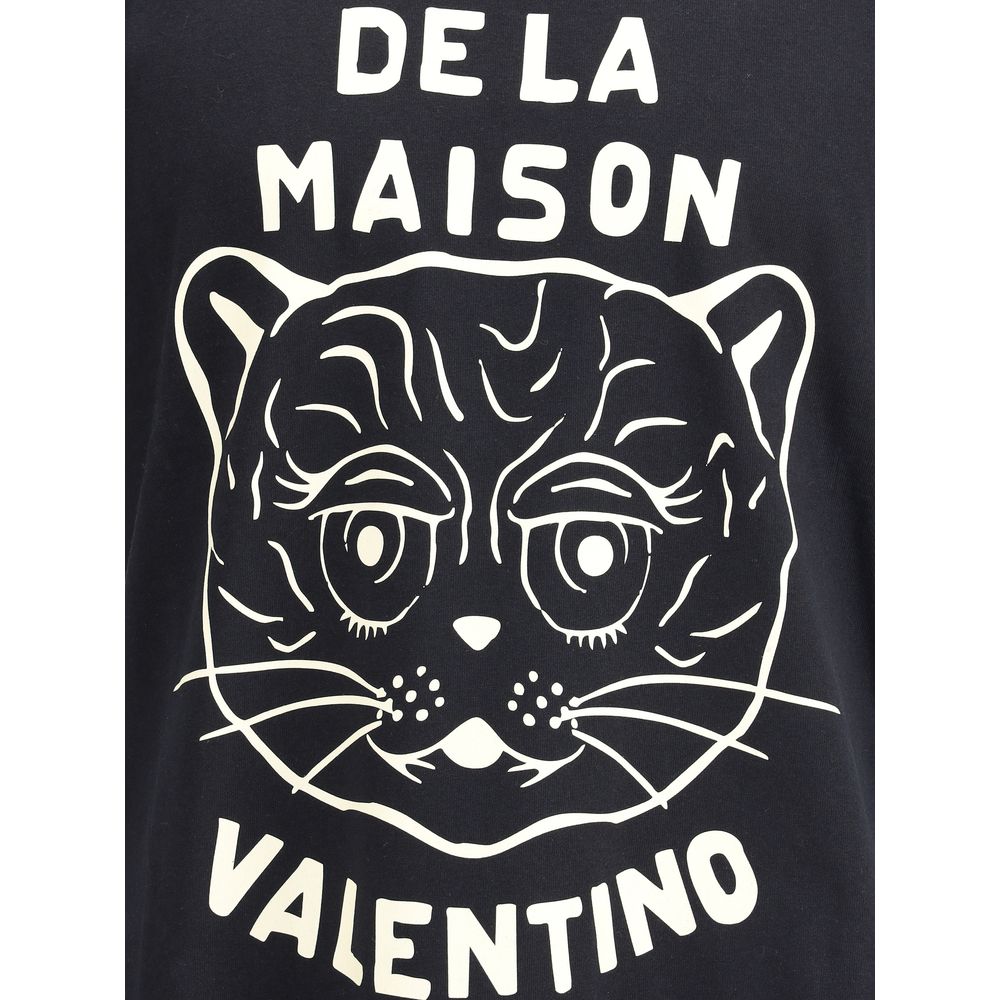 Valentino Black Cotton T-Shirt featuring Le Chat De La Maison graphic, showcasing casual elegance for AW25.