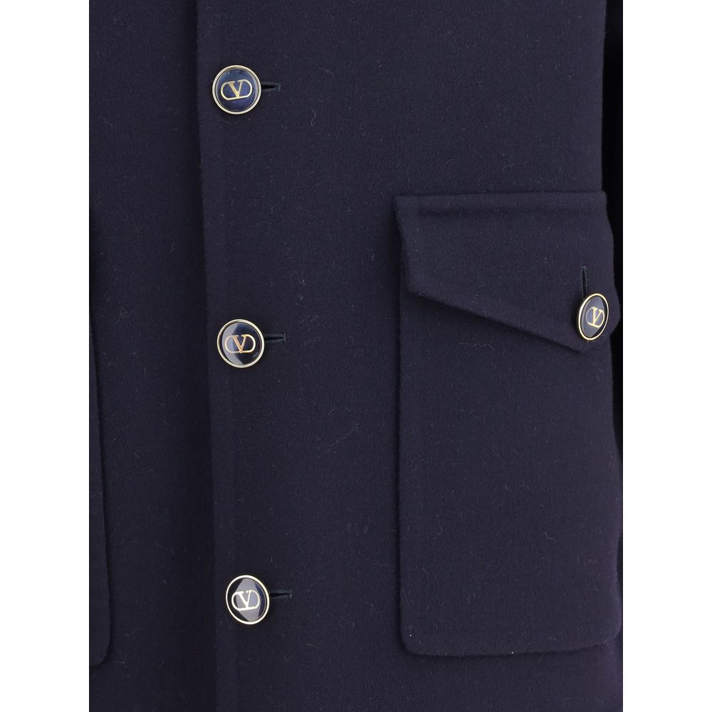 Valentino Blue Fleece Wool Coat with flap pockets and button details, showcasing elegant design and craftsmanship.