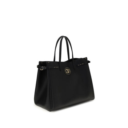Valentino Garavani Black Calf Leather Bos Taurus Handbag with metallic logo and protective feet