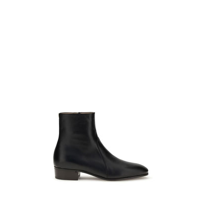 Valentino Garavani Black Goatskin Ankle Boots with brass VLogo detail and leather sole.