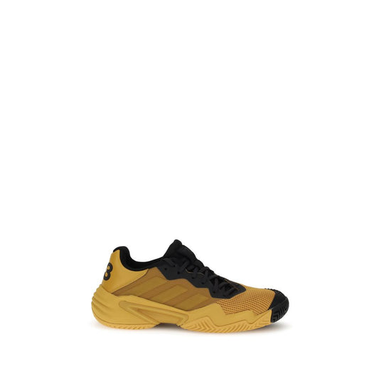 Y-3 Yellow Rubber Athletic Sneakers with breathable mesh upper and durable Adiwear outsole for advanced performance and comfort.
