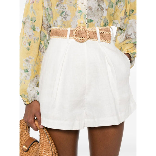 Zimmermann Shorts Ivory with high-waisted design, belt loops, rear zip fastening, and side slit pockets made of Rhiannon linen.