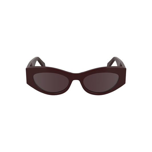 Calvin Klein red cat-eye acetate sunglasses with brown lenses.