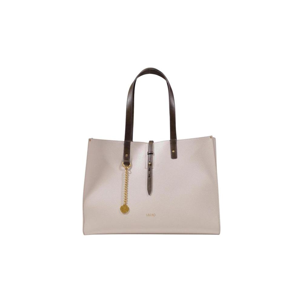 Front view with bag zipped and handles upright.